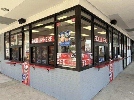 Order and pick-up windows on both corners of the building.