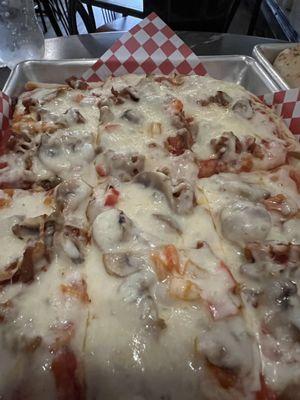 1/2 Tray specialty Pizza!!! It it's your first time here get this!!!