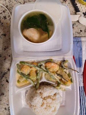 $8.99 combo-shrimps with veggies in coconut sauce, chicken with greens soup, and steamed rice.