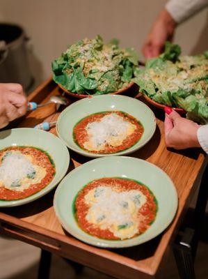 Eggplant parmigiana and vertical roots green salad