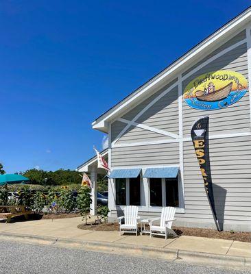 Outside exterior of shop, short walk across Ocean Blvd from Corolla public beach access area