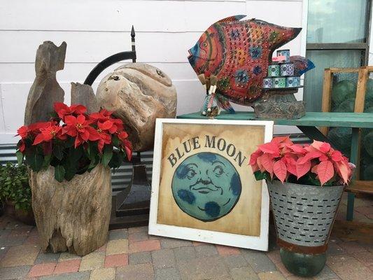 Real globes, vintage windows, candles and fish lantern.