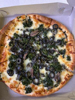 Pizza came with olives and anchovies and is listed as something completely different on their menu as what is on my order receipt