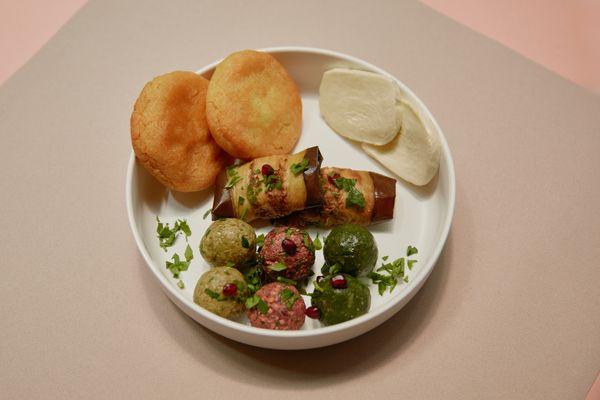 Taste of Georgia!  
eggplant, beets, spinach and green beans spreads with walnut, served with corn bread and cheese!