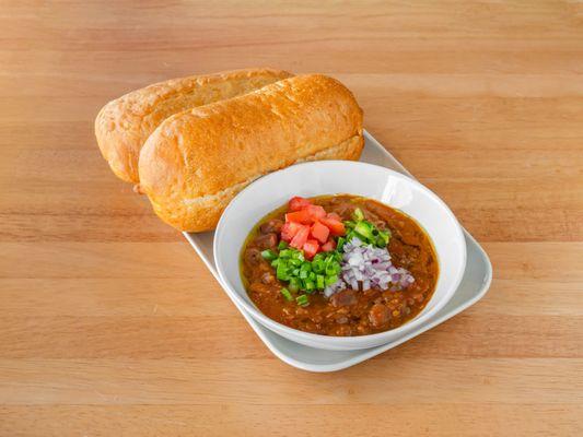 Ful 
(fava beans + ethiopian spices + tomato + green onion + red onion + jalapeno served with a roll of bread)