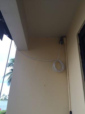 As you can see the electrical outlet is uncovered & the cord for my awning was left dangling.