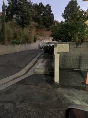 Water going down the driveway getting wasted.