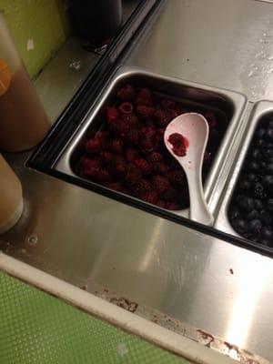 Rotten raspberries and grime