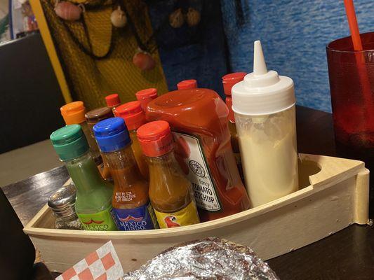 Every sauce you could ever want- bonus points for the adorable boat