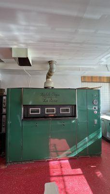 Both La Rosa and another pizza spot (Sano's on Lawrence) Have old school Faulds pizza ovens - from the 60s