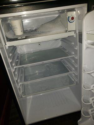 Used cup in mini fridge