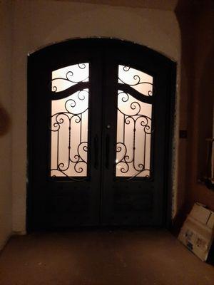 Custom Ornamental Iron Pair of Doors with Glass Panels