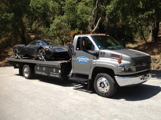 George with a $1.3 million 2014 Pagani Huayra on his flatbed.