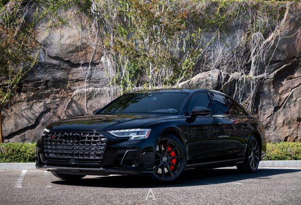 This Audi S8 pops with it's new painted red calipers! We also added ceramic window tint for UV protection and style!