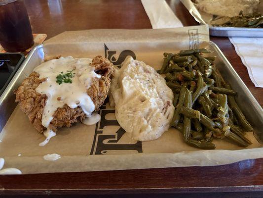 Chicken fried steak with mashed potatoes and green beans