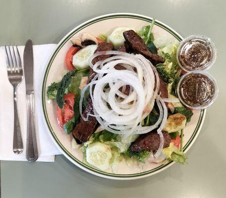 This diner is full service and has many amazing dishes including the very affordable steak salad with house dressing.