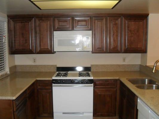 Studio condo remodel, cabinets, granite, tile, fixtures, lighting, tub and surround, toilets.