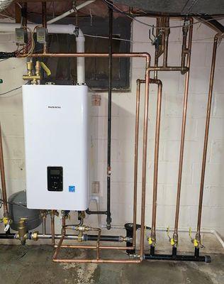 Behold the future of hot water! Navien Tankless Water Heaters are the pinnacle of efficiency and modern technology...