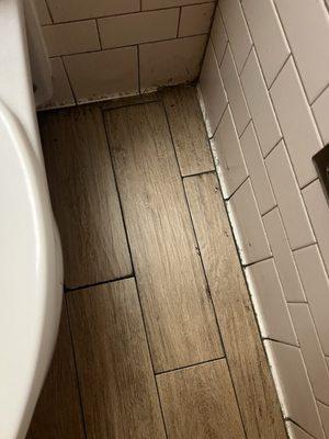 Dirty bathroom floor