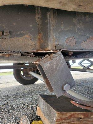 Broken leaf spring mount bracket, 228 miles from home.