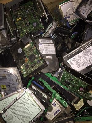 Hard drives waiting to be destroyed and recycled.