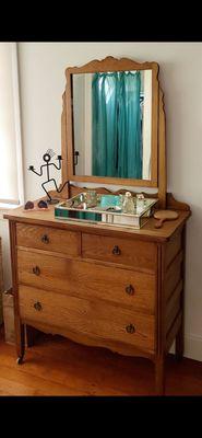 My oak dresser with a mirrored tray that I love