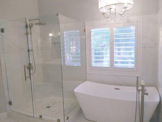 Separate walk-in shower and tub