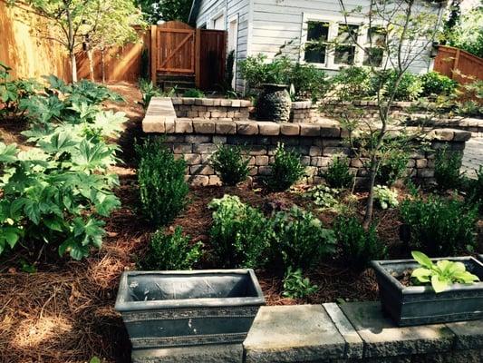 Courtyard Makeover in Virginia Highlands. Seat walls, patio space, water feature.