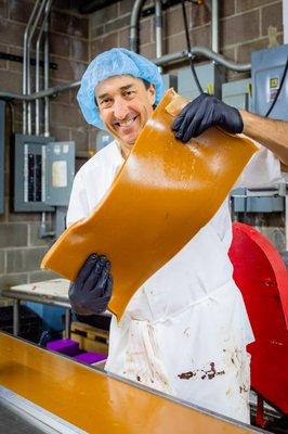 Si holding up a beautiful slab of Caramel!