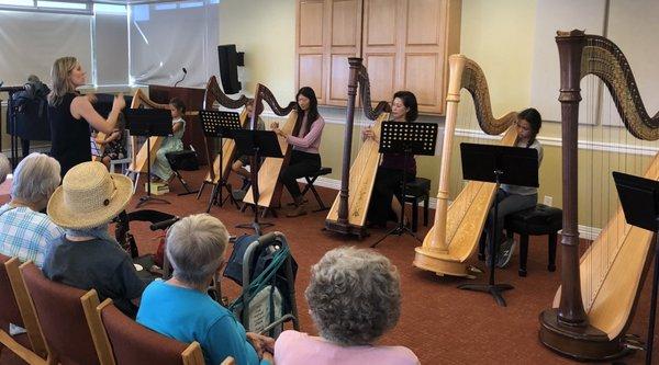 Jessica's studio performs for families and residents at Piedmont Gardens in Oakland