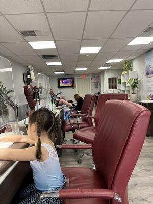 Daughter getting her nails done