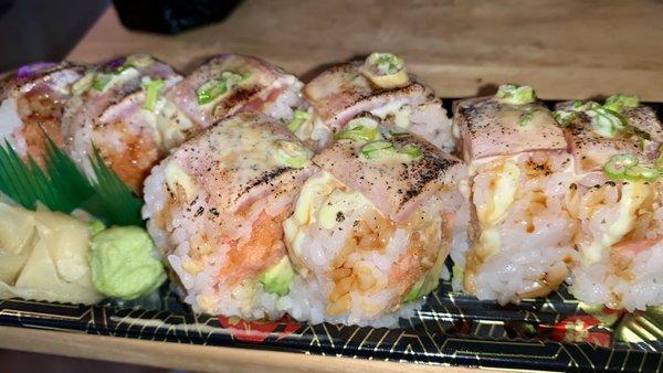 Crazy tuna roll.  No masago, soy wrapper, added eel sauce.  Delicious!