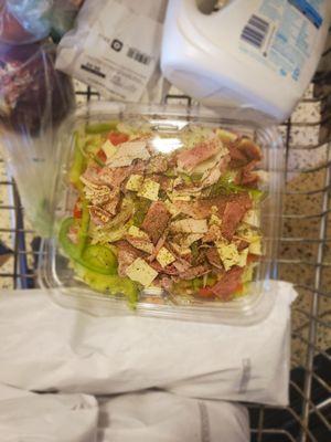 I got a ultimate salad with lettuce, tomatoes, green peppers, onions, pepper jack cheese, ham, turkey, roast beef