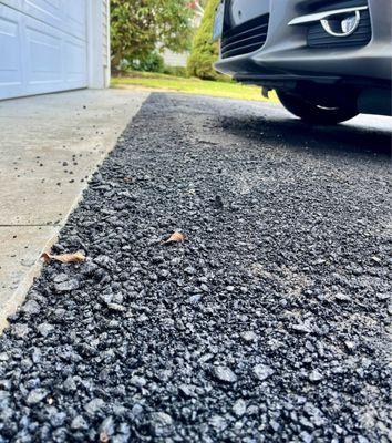 Asphalt overlay- loose, uneven, not complete