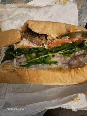 This is an unedited photo of how I got my sandwich.  This is terrible!! It's supposed to be a footlong Steak and Cheese.