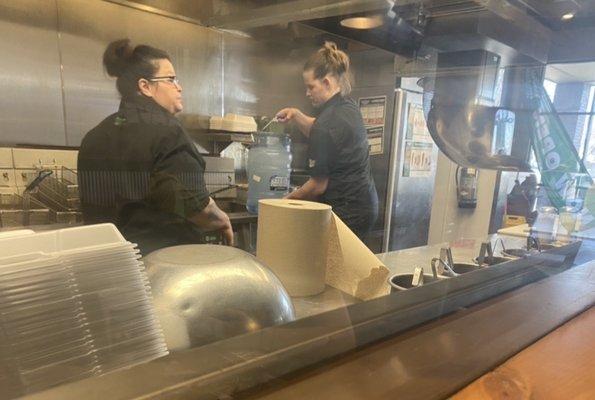 Ladies hard at work making fresh food for us.