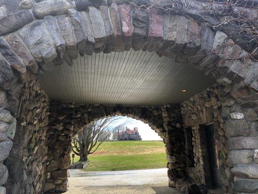 Carriage house archway looking up the hill to the main house.