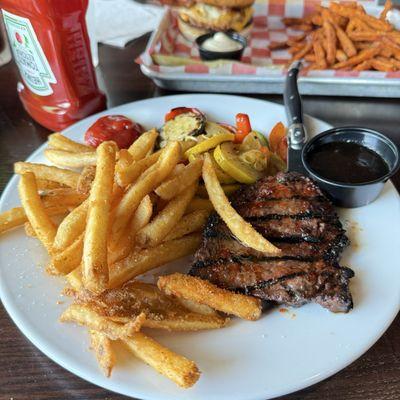 Sriracha Steak, fries and veggies. The steak and sauce a disappointment.