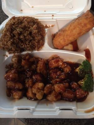 General Tso's chicken with fried rice and an egg roll.