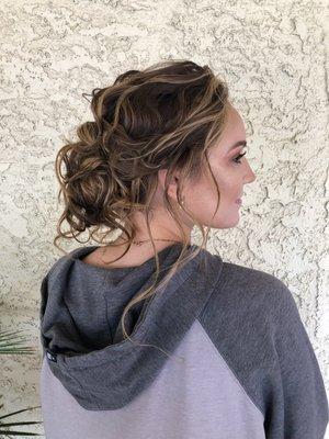 Great accent Aveda hair color. Beautifully crafted prom hairstyle