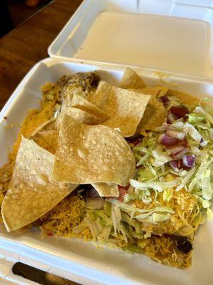 Beef enchilada. Beans and chips.