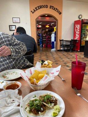 Carnitas Tacos and Taco Salad. Entry to the gas station store.