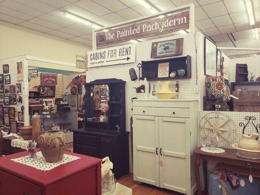 Furniture, home goods, and signs.