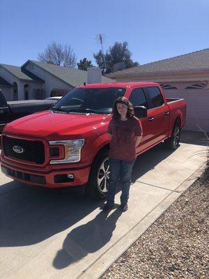 My daughter and her new truck.