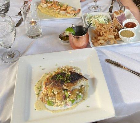 Shrimp and scallop with grits, Tuna Steak with wasabi salad, Blackened grouper. All excellent meals!