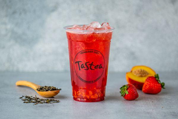 Peach Me Sweetea: Our signature peach and strawberry black tea with real fruit bits of both