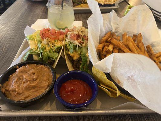 Tacos. Refried beans. Fries