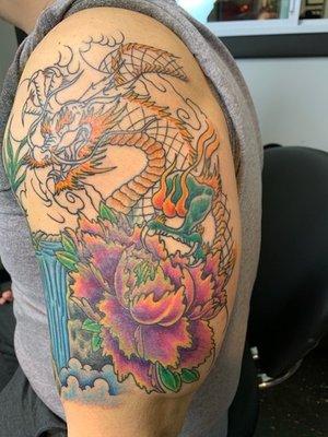 Different angle of session 2 of 4 cover of old tattoo (under the flower and body of dragon).