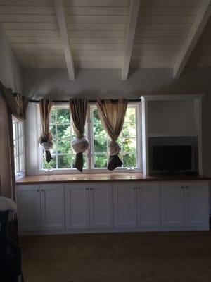 Custom white cabinets with natural cherry counter top