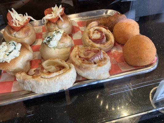 Stuffed garlic knots, rice ball and potato croquettes.